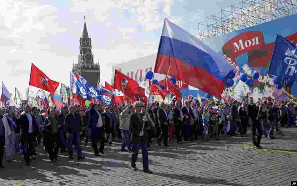 Members of Russian Trade Unions march during the May Day celebration in Red Square, Moscow, Russia, on Thursday, May 1, 2014.