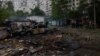 A view of a destroyed car at a site of a Russian airstrike in Kharkiv, Ukraine, May 14, 2024. 