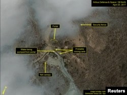 FILE - Commercial satellite imagery of the Punggye-ri nuclear test facility, which 38 North says indicates an apparent resumption of activity in North Korea, is seen in this image from April 25 released on May 3, 2017.