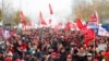 Trainees and employees of German carmaker Audi demand higher wages during a protest march in front of the company's headquarters in Ingolstadt, Germany, Oct. 29, 2024.