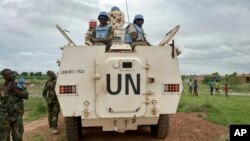 FILE - Peacekeepers from the United Nations Mission in South Sudan (UNMISS) provide security in Bentiu, South Sudan, June 18, 2017.