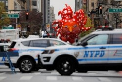 Yayoi Kusama's "Love Flies Up to the Sky" balloon is seen during the 94th Macy's Thanksgiving Day Parade, which was closed to spectators due to the spread of COVID-19, in Manhattan, New York City, November 26, 2020.