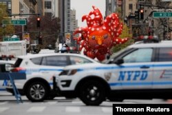Yayoi Kusama's "Love Flies Up to the Sky" balloon is seen during the 94th Macy's Thanksgiving Day Parade, which was closed to spectators due to the spread of COVID-19, in Manhattan, New York City, November 26, 2020.