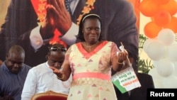 Simone Ehivet Gbagbo, wife of Laurent Gbagbo, attends a rally at the Culture Palace in Abidjan, January 15, 2011.