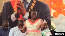 Simone Ehivet Gbagbo, wife of Laurent Gbagbo, attends a rally at the Culture Palace in Abidjan, January 15, 2011.