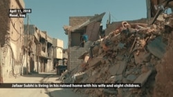 Family Returns to Crumbling Home in Old Mosul