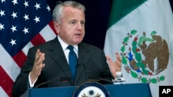 Deputy Secretary of State John J. Sullivan told a press conference in Washington, Dec. 14, 2017, the Trump administration "refuses to ignore the problem" of transnational crime.