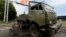 A wrecked Kamaz truck is seen near the Donetsk airport, Ukraine, May 27, 2014. 