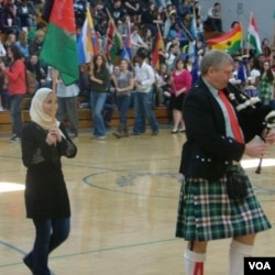 One way Afghan students in the US represent the country - participating in cultural events, like this one at Farima's high school