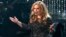 FILE - British singer Adele perfoms the song "Skyfall" from film "Skyfall," nominated as best orginal song, at the 85th Academy Awards in Hollywood, California.