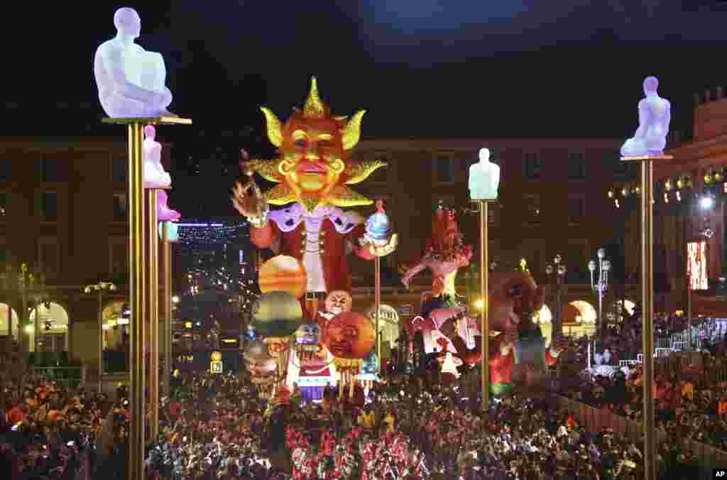 The King of Energy float leads the Queen and other floats during the Nice Carnival 2017 parade, in Nice, southeastern France, Feb. 11. 2017.