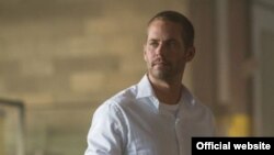 Aktor Paul Walker dalam salah satu peran terakhirnya dalam "Furious 7". 