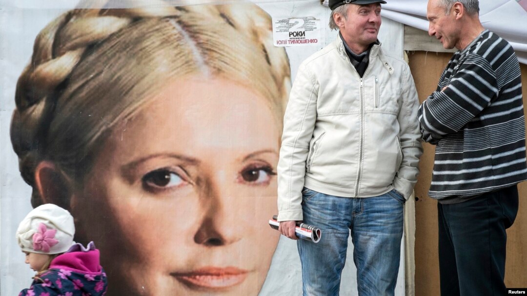Supporters of jailed former Ukrainian Prime Minister Yulia Tymoshenko chat in a protest tent camp in central Kiev on Oct. 7, 2013. 
