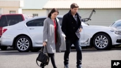 FILE - New Zealand Labour leader Jacinda Ardern and partner, Clarke Gayford, arrive for a funeral at St David's Cooperating Parish in Te Aroha, New Zealand, Sept. 22, 2017. 