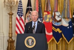 FILE - President Joe Biden speaks in the East Room of the White House, in Washington, July 8, 2021.