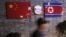 FILE: Flags of China and North Korea are seen outside the closed Ryugyong Korean Restaurant in Ningbo, Zhejiang province, China, April 12, 2016.