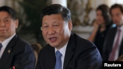 FILE - China's President Xi Jinping speaks during a bilateral meeting with U.S. President Donald Trump at Trump's Mar-a-Lago estate in Palm Beach, Florida, U.S., April 7, 2017.