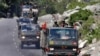 An Indian Army convoy moves along a highway leading to Ladakh, at Gagangeer in Kashmir's Ganderbal district, June 18, 2020.