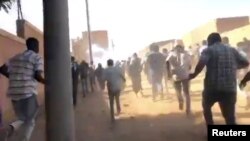 Des manifestants dispersés à coup de bombes lacrymogènes lors d'une manifestation antigouvernementale à Omdurman, au Soudan, le 9 janvier 2019; capture d’écran Haitham Seo / via REUTERS 