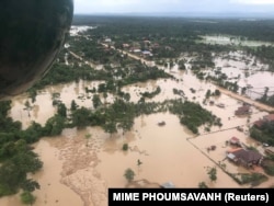 FILE - An aerial view shows the flooded area after a dam collapsed in Attapeu province, Laos, July 25, 2018, in this image from social media.