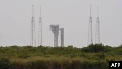 This NASA photo shows a United Launch Alliance Atlas V rocket with Boeing’s CST-100 Starliner spacecraft aboard at sunrise on the launch pad at Space Launch Complex 41 on Aug. 3, 2021 at Cape Canaveral Space Force Station in Florida.