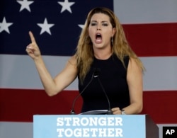 Former Miss Universe Alicia Machado gestures before a speech by Democratic presidential candidate Hillary Clinton, Nov. 1, 2016