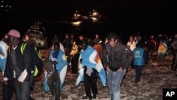 Migrants fleeing Libya unrest arrive on the island of Lampedusa, Italy on May 8, 2011.