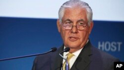 Rex W. Tillerson gives a speech at the annual Abu Dhabi International Petroleum Exhibition & Conference in Abu Dhabi, United Arab Emirates in 2016 when he was ExxonMobil CEO and chairman. 