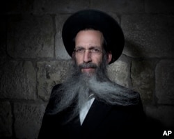 Tzvi Schiff, an Ultra-Orthodox Jew, poses for a portrait in Jerusalem's Old City, Feb. 11, 2018.