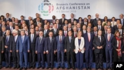 Leaders and delegates pose for a group picture during the Brussels Conference on Afghanistan, in Brussels, Belgium Oct. 5, 2016.