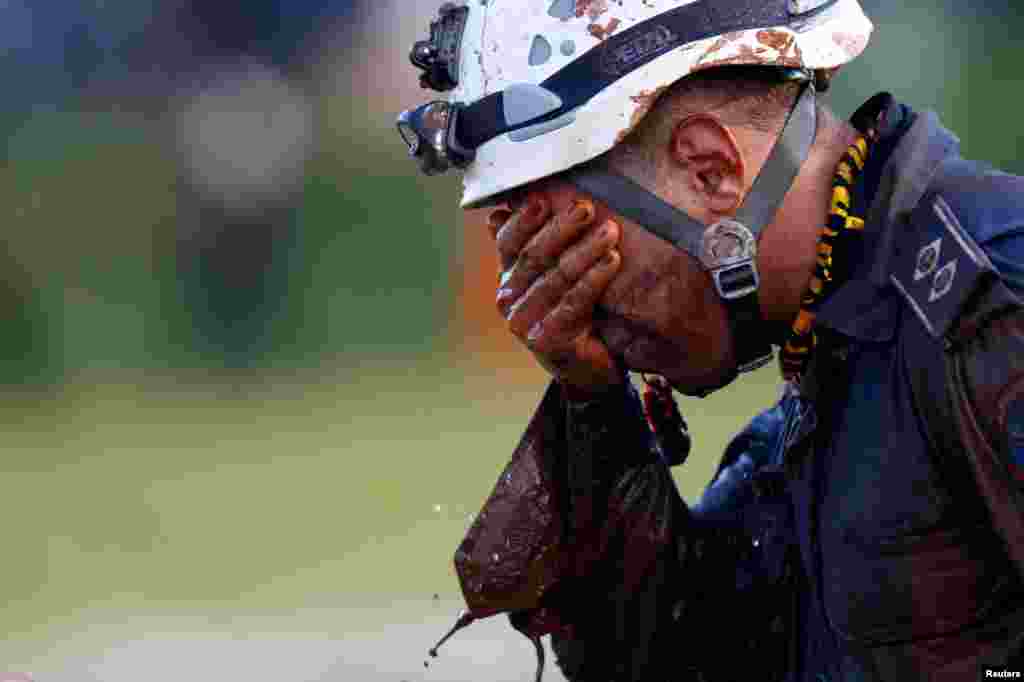 A member of a rescue team reacts after searching for survivors of the collapse of a dam owned by Brazilian mining company Vale SA, in Brumadinho, Jan. 27, 2019.