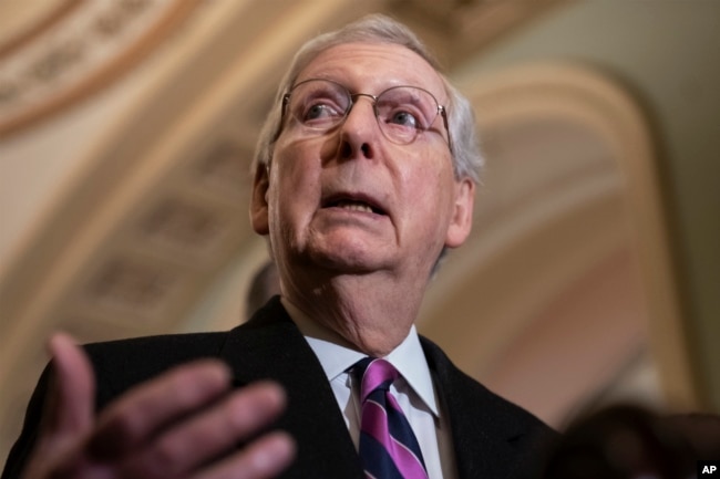 FILE - Senate Majority Leader Mitch McConnell, R-Ky., speaks to reporters on Capitol Hill in Washington, Feb. 26, 2019.