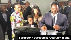 Le président Joseph Kabila accompagné de sa famille vote à Gombe, Kinshasa, RDC, 30 décembre 2018. (Facebook/Guy Momat)