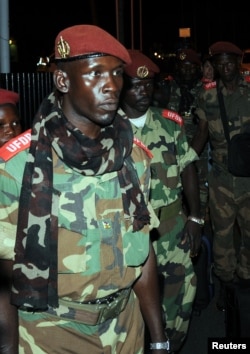 Soldiers from Central African Republic's Seleka rebel group arrive at the airport ahead of planned peace talks with the Central African Republic's government, Libreville, Gabon, Jan. 7, 2013.