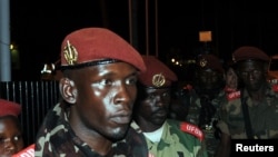 Soldiers from CAR's Seleka rebel group arrive at the airport ahead of planned peace talks with the CAR's government, Libreville, Gabon, Jan. 7, 2013.