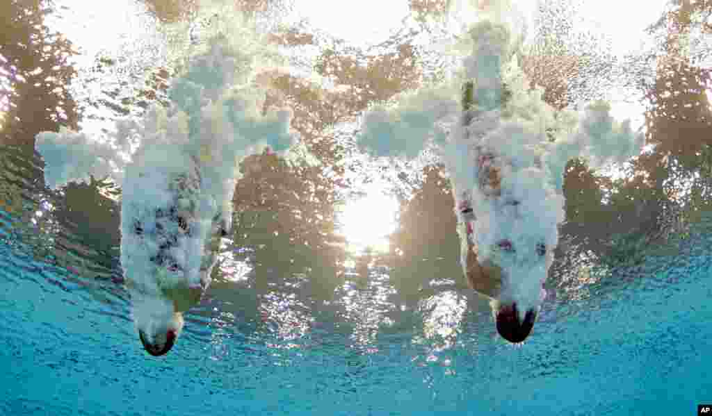 Meaghan Benfeito and Roseline Filion of Canada competing in the women's synchronized 10-meter platform diving final.