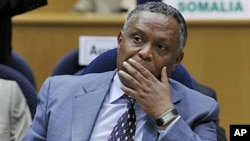 Eritrea Ambassador to AU, Girma Asmerom, listens as Secretary of State Hillary Rodham Clinton addresses the African Union at the African Union Commission headquarters in Addis Ababa, Ethiopia, June 2011. (file photo)