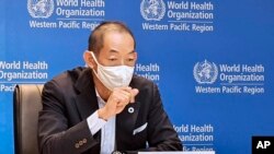 资料照：世界卫生组织西太平洋区域主任葛西健（Takeshi Kasai）在记者会上。（2021年11月11日美联社）