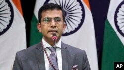 FILE - Indian Foreign Ministry spokesperson Raveesh Kumar delivers a press statement in New Delhi, India, Feb. 27, 2019.