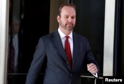 FILE - Rick Gates, former campaign aide to U.S. President Donald Trump, departs after a bond hearing at U.S. District Court in Washington.
