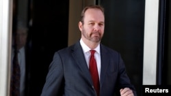 FILE - Rick Gates, former campaign aide to U.S. President Donald Trump, departs after a bond hearing at U.S. District Court in Washington.