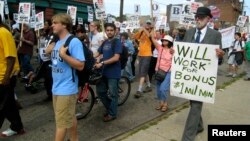 Protesters called on global leaders to do more to create jobs for the growing number of unemployed in the United States and globally, at a peaceful march in Pittsburgh, Pennsylvania, September 20, 2009.