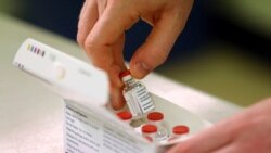 Doses of the COVID-19 vaccine developed by Oxford University and U.K.-based drugmaker AstraZeneca are checked as they arrive at the Princess Royal Hospital in Haywards Heath, England, Saturday Jan. 2, 2021. (AP)