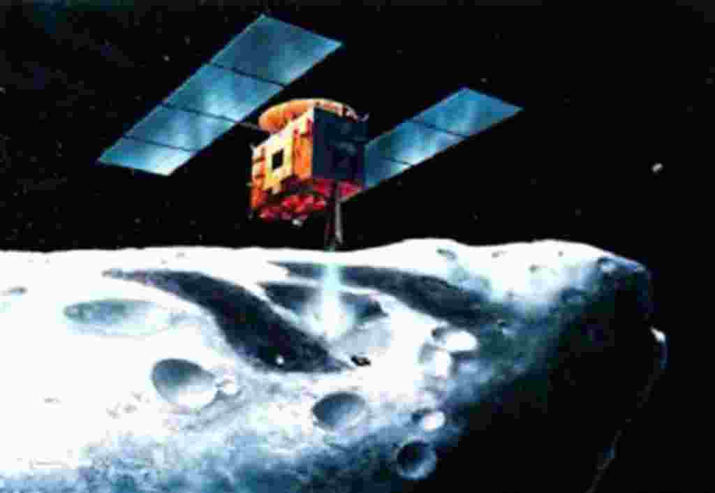 En esta versión artística distribuida por la Agencia Espacial Japonesa de Exploración se puede ver a la sonda Hayabusa flotando encima de un asteroide a unos 290 millones de kilómetros de distancia entre la Tierra y Marte.