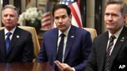 U.S. Secretary of State Marco Rubio, center, White House National Security Adviser Mike Waltz, right and U.S. Middle East envoy Steve Witkoff are seen after meeting with Russian officials, at Diriyah Palace, in Riyadh, Saudi Arabia, Feb. 18, 2025.