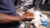 Hungry Venezuelans Pick Through Garbage for Food