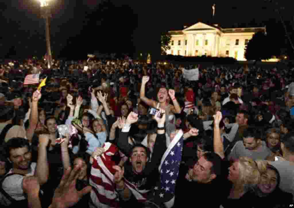 Crowds gathers outside the White House in Washington early Monday, May 2, 2011, to celebrate after President Barack Obama announced the death of Osama bin Laden. (AP Photo/Manuel Balce Ceneta)