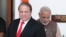 Pakistan's Prime Minister Nawaz Sharif (L) arrives for his bilateral meeting with his Indian counterpart Narendra Modi in New Delhi, May 27, 2014.