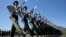 Chinese troops practice marching ahead of a Sept. 3 military parade, on the outskirts of Beijing, Aug. 22, 2015.
