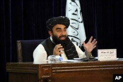 Taliban spokesman Zabihullah Mujahid speaks during a press conference in Kabul, Afghanistan, Sept. 7, 2021.